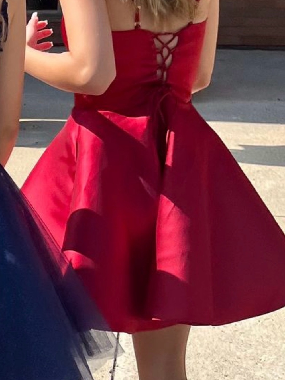 Red size 0 grad dress 
Worn once for about 2 hrs 

Perfect condition